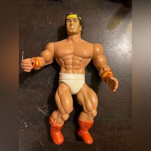 Action Figure with Red Boots and White Shorts